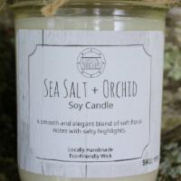 Sea Salt And Orchid Candle  · A smooth and elegant blend of soft floral notes and salty highlights.