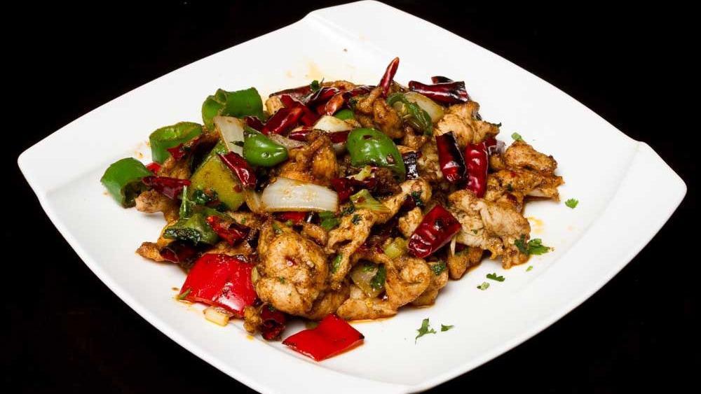 L Cumin Chicken · *Lamb entree is pictured*