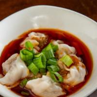 Wontons In Chili Oil · Spice level 6/10. Eight steamed pork wontons with a thinner casing in spicy/sour chili oil. ...