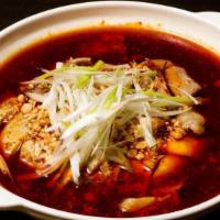 Chicken In Chili Oil · Spicy. COLD sliced chicken with chili oil, topped with scallions and sesame seeds.
