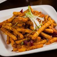 Cumin Fries · Mild Spice. Spicy, seasoned crinkle fries. Served with ketchup packets.