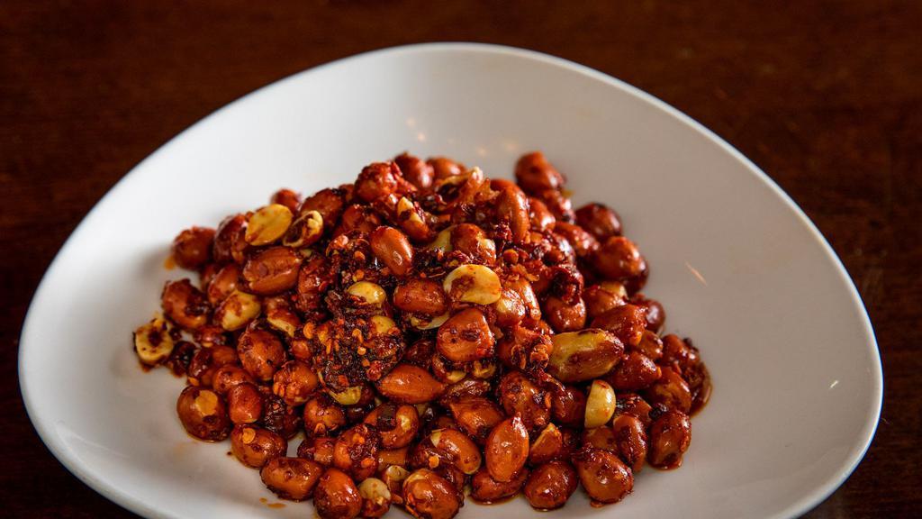 Crazy Peanuts · Spicy. Shelled peanuts tossed with chili oil and sugar.