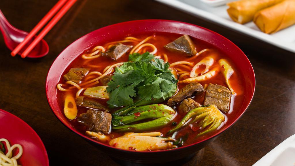 Braised Beef Noodle Soup · Not Spicy. Braised beef cubes, bok choy, bamboo and scallions in a beef broth. Spicy option available.