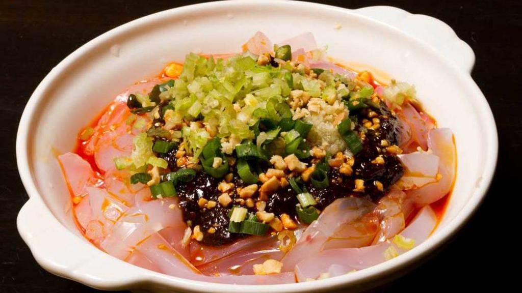 Mung Bean Noodle In Black Bean Sauce · Spicy. COLD mung bean noodles in a black bean garlic sauce. Topped with sesame seeds and scallions.