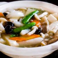 Tofu Pot Gf · Soft tofu and mixed vegetables in traditional Chinese white sauce. No spice.