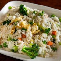 Fried Rice Gf · Seasoned & stir-fried rice with peas, carrots, and onions. Not spicy. . (Egg option just egg...