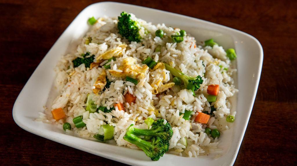 Fried Rice Gf · Seasoned & stir-fried rice with peas, carrots, and onions. Not spicy. . (Egg option just egg and rice). (Vegetable option inc. broccoli & snow peas)
