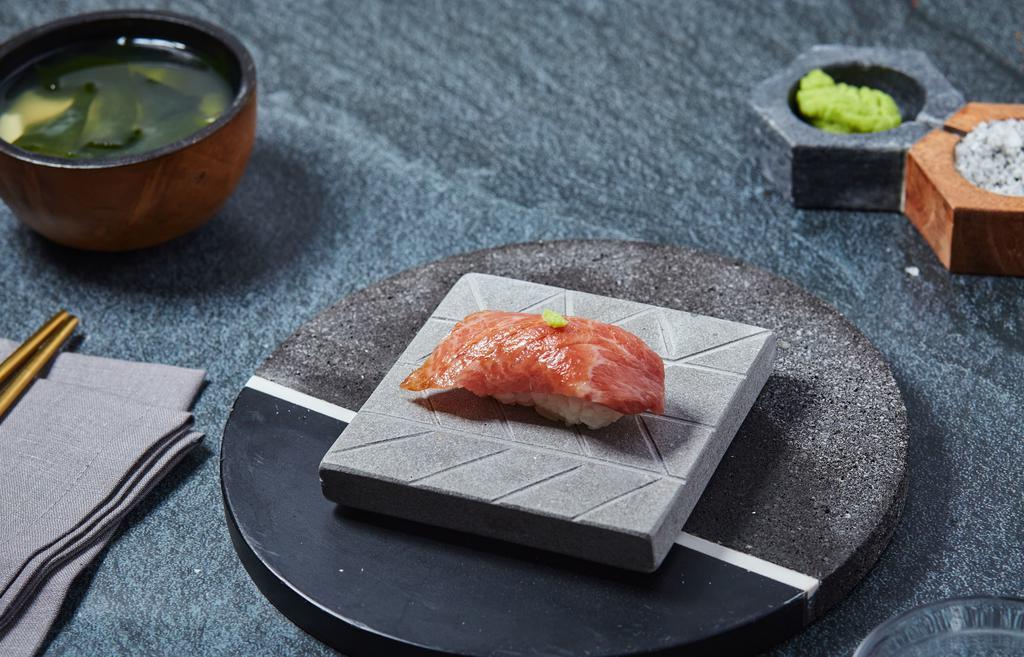 Otoro Nigiri · Extra fatty bluefin tuna with wasabi and nigiri soy. Served with chef's choice of toppings.
