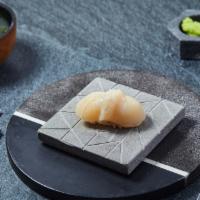 Hotate Nigiri · Scallop with sea salt lemon. Served with chef's choice of toppings.