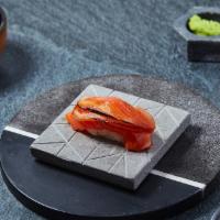 Tomato Salmon Nigiri · Salmon with grilled tomato and onion aioli. Served with chef's choice of toppings.