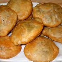 Kachori · One pound. Round flour ball stuffed with a mixture of lentils and spices.
