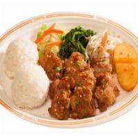 Spicy Garlic Chicken · Crispy boneless chicken in our special spicy garlic  sauce. Served with two scoops of rice.