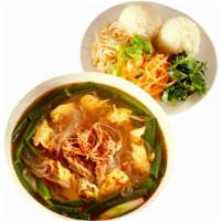 Yook Gae Jang · Spicy hot soup with Korean hot sauce and spices. Prepared with long rice and egg. Served wit...