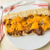 Philly Cheesesteak · Ground thinly sliced beef steak with bell peppers, onions and your choice of melted cheese.