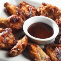 Bbq Chicken Wings · Fresh chicken wings smothered in a house made savory bbq sauce.
