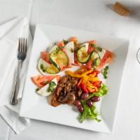 Caprese Salad · Fresh Mozzarella and tomatoes garnished with roasted peppers, marinated eggplant, zucchini, ...