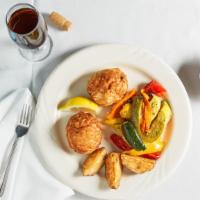 Crab Cakes · Jumbo lump crab cakes, baked and served with mixed vegetables or pasta.