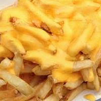 Cheese Fries With Gravy · French fries with choice of cheese melted on top served with gravy for dipping.