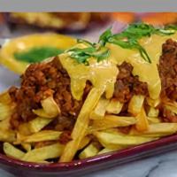 Chili Cheese Fries · French fries with chili with choice of cheese melted on top.