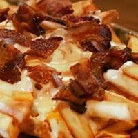 Bacon Cheese Fries  · French fries with bacon with a choice of cheese melted on top.