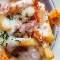 Italian Fries · French fries with choice of cheese melted on top served with marinara for dipping.
