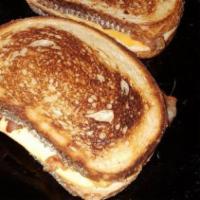 Grilled Cheese Sandwich · Hot sandwich filled with cheese that has been pan cooked or grilled.