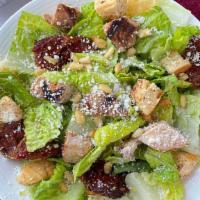 Caesar Salad With Chicken · Romaine, grilled chicken, Parmesan cheese, pine nuts, sundried tomatoes, Caesar dressing, cr...