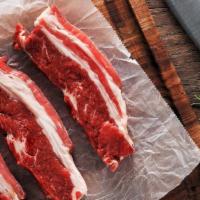Short Ribs - 1.5Lbs · Short ribs are a cut of beef taken from the brisket, chuck, plate, or rib areas of beef catt...