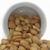 Marcona Almonds 8Oz · A salty favorite on any cheese board! Spanish almonds roasted in olive oil and sprinkled in ...