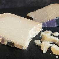 Midnight Moon 1/2 Lb · Midnight Moon is an enormously popular aged gouda. It’s produced in Holland, although it’s v...