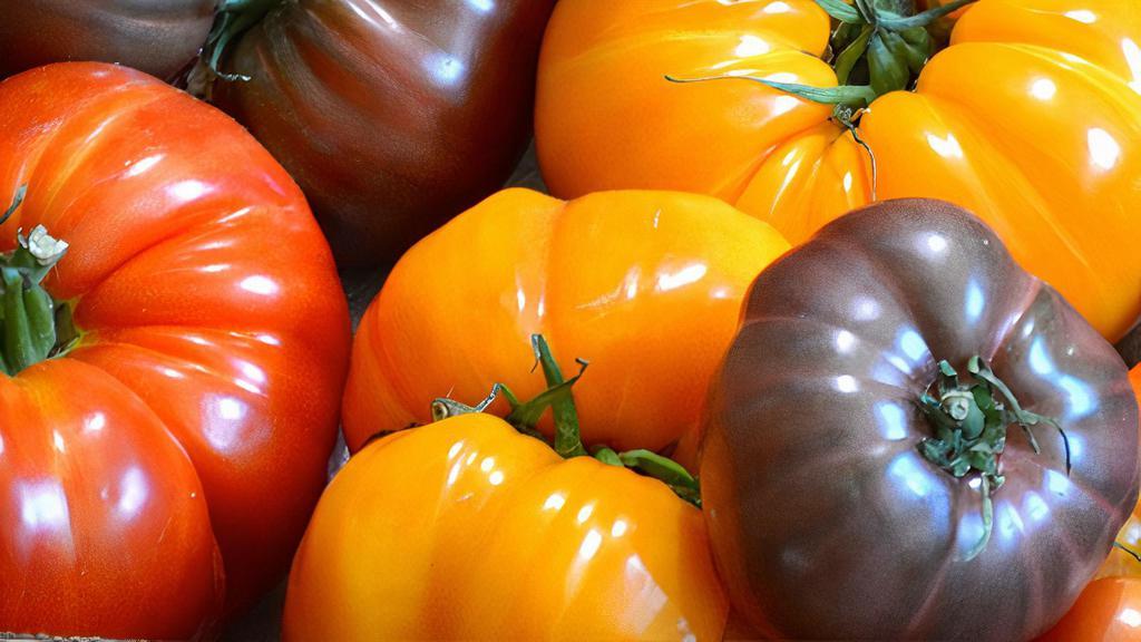 Heirloom Tomatoes - Each · Unique, vibrant, juicy.  1 Tomato = 1.88lb