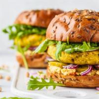 Veggie Burger · Delicious burger, made with a juicy veggie patty topped with American cheese, lettuce, tomat...