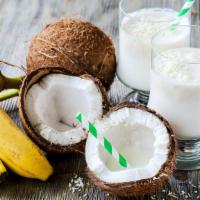 Coconut Shake · Fresh coconut water, coconut meat, raw cocoa, and fresh fruit.