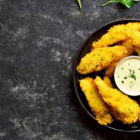 Garlic Parmesan Chicken Fingers · Crispy, golden fried chicken fingers with garlicky, cheesy dipping sauce.