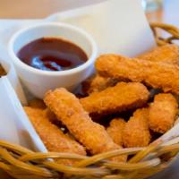 Bbq Chicken Fingers · Crispy, golden fried chicken fingers with sweet and smoky BBQ dipping sauce.