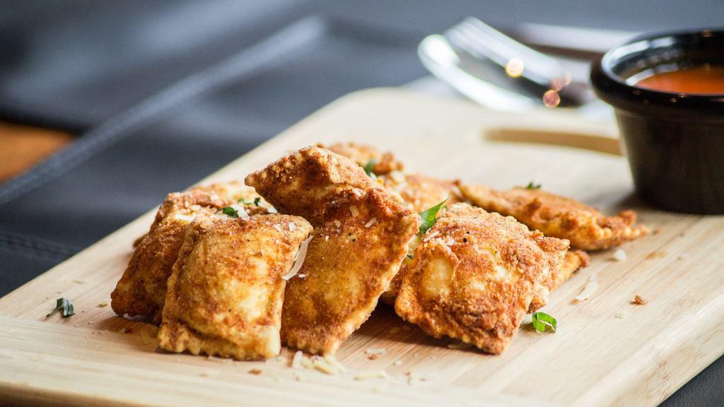 Fried Ravioli (6 Pcs) · Ravioli filled with ricotta, romano, mozzarella and asiago cheese and fried to golden perfection.