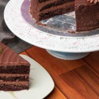 Outrageously Chocolate Layer Cake · Decadent, moist, chocolatey layers of cake sure to satisfy your sweet tooth.