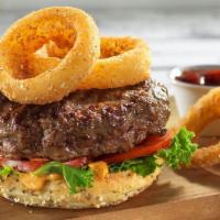 Western Burger  · Fresh Patty, Onion Rings, American & Swiss Cheese, Lettuce and Tomatoes on a Toasted Sesame ...