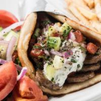 Lamb Gyro · Served on a pita bread with lettuce and tomatoes. Choice of either white sauce, BBQ, or hot ...