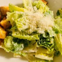 Caesar Salad · Romaine lettuce, croutons, shaved parmesan, homemade Caesar dressing.