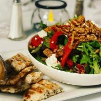 Baby Greens Salad · Crispy onions, goat cheese, roasted peppers, candied pecans, homemade rosemary vinaigrette