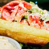 New England Lobster Roll · Chunks of fresh lobster meat salad on a toasted buttered hot dog roll