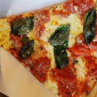 Margherita Pizza Slice · With fresh mozzarella, plum tomato  sauce, basil & olive oil.
