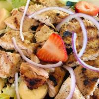 Grand Bahama Chicken Salad · Lettuce, tomato, onion, cucumber, grilled chicken, fresh strawberries (in season), banana, a...