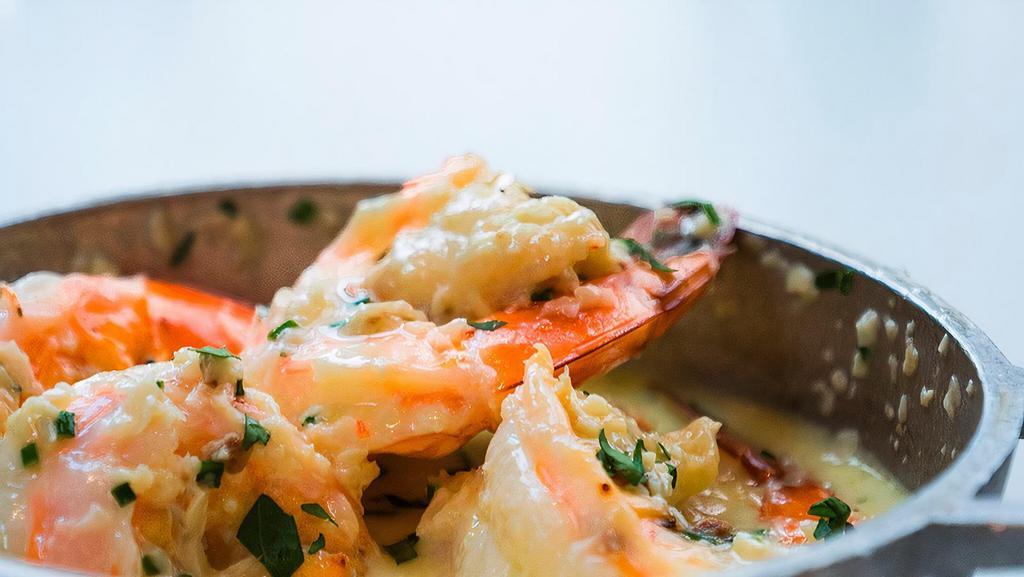 Camarones Al Ajillo · sautéed jumbo shrimp, white wine garlic sauce.