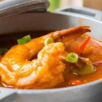 Camarones Enchilado · creole style sautéed jumbo shrimp, peppers, olives, onions.