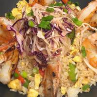 Arroz Chino-Cubano (No Sides) · New. grilled shrimp, vegetable & egg stir-fried rice, peas, soy, cabbage.