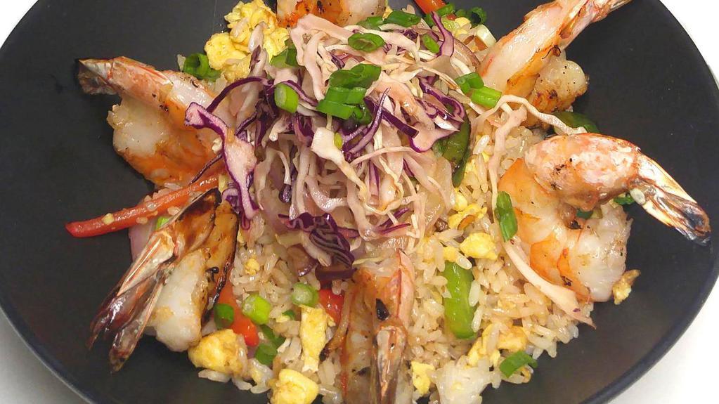 Arroz Chino-Cubano (No Sides) · New. grilled shrimp, vegetable & egg stir-fried rice, peas, soy, cabbage.
