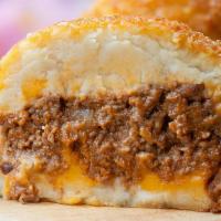 Papa Rellena · mashed potato stuffed with ground beef. with salsa ranchera for an additional charge.