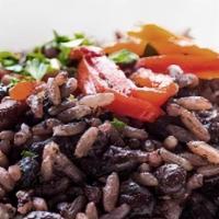Moros Y Cristianos (Made With Pork) · black beans and rice.